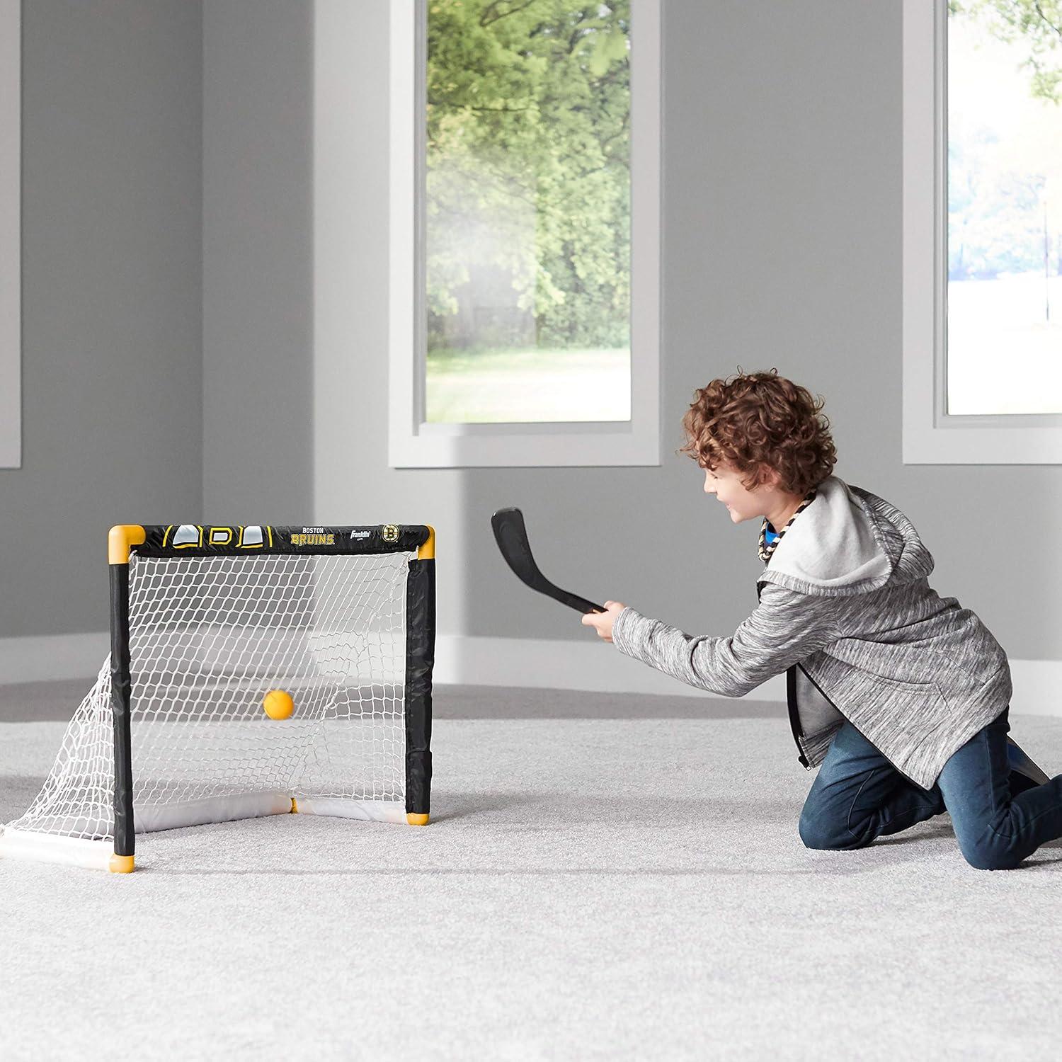 imageFranklin Sports NHL Mini Hockey Set Kids Indoor Knee Hockey Goal Ball 2 Stick Combo Youth Team Indoor Toy Set Official Ages 3Boston Bruins