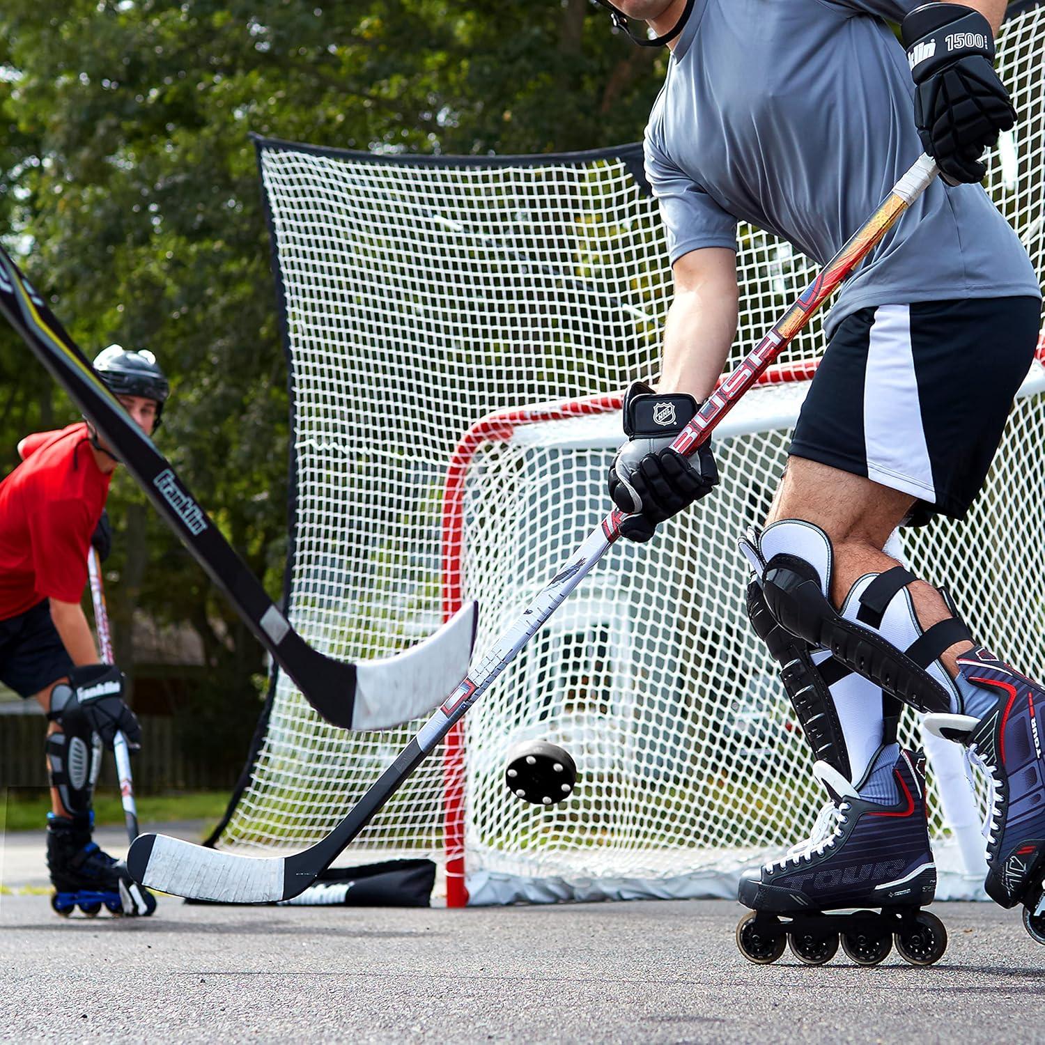 imageFranklin Sports NHL Street Roller Hockey Pucks Pro Commander Outdoor Roller Hockey Pucks for Practice Training Outdoor Hockey Street Pucks with Rollers 24 Bulk Packs 6 Packs Single PucksBlack Pack of 24
