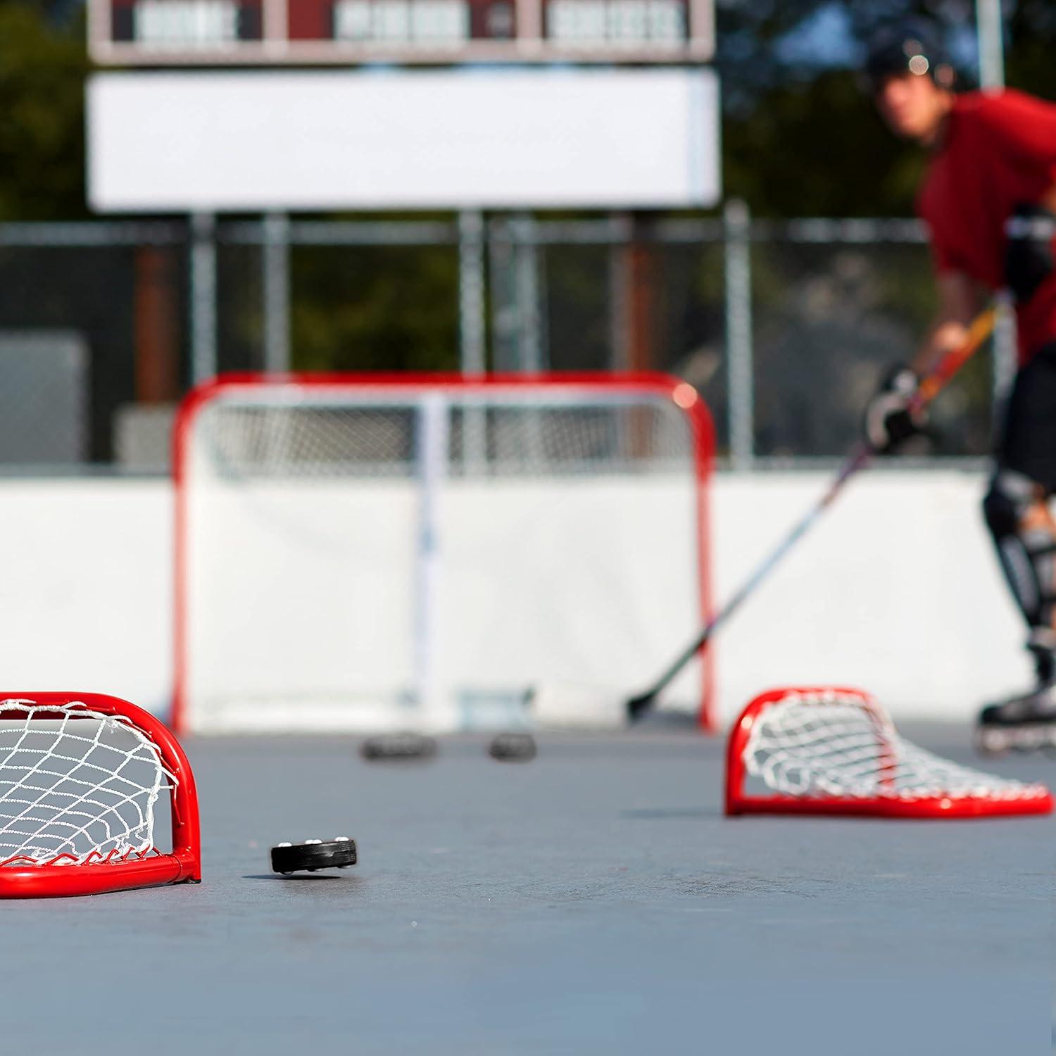 imageFranklin Sports NHL Street Roller Hockey Pucks Pro Commander Outdoor Roller Hockey Pucks for Practice Training Outdoor Hockey Street Pucks with Rollers 24 Bulk Packs 6 Packs Single PucksBlack Pack of 24
