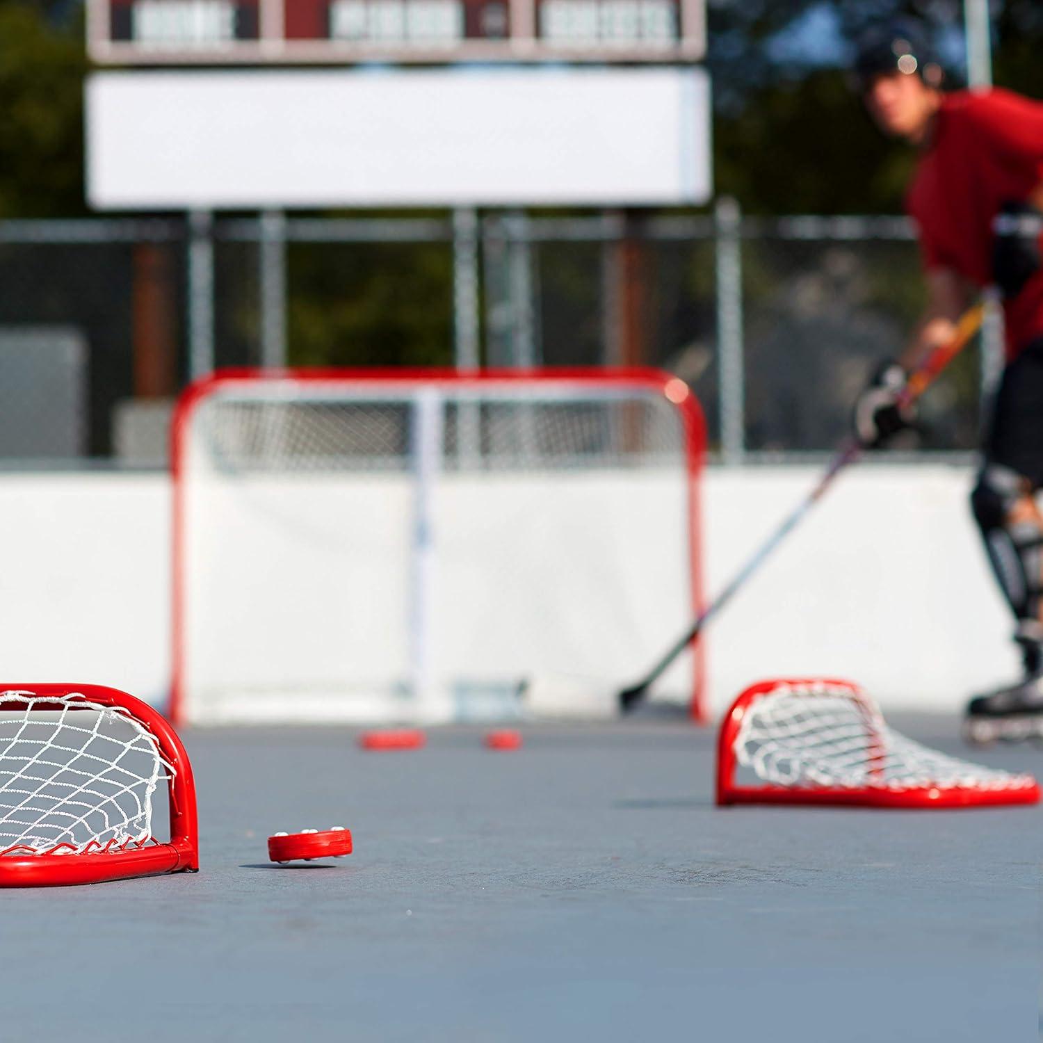 imageFranklin Sports NHL Street Roller Hockey Pucks Pro Commander Outdoor Roller Hockey Pucks for Practice Training Outdoor Hockey Street Pucks with Rollers 24 Bulk Packs 6 Packs Single PucksRed Pack of 24
