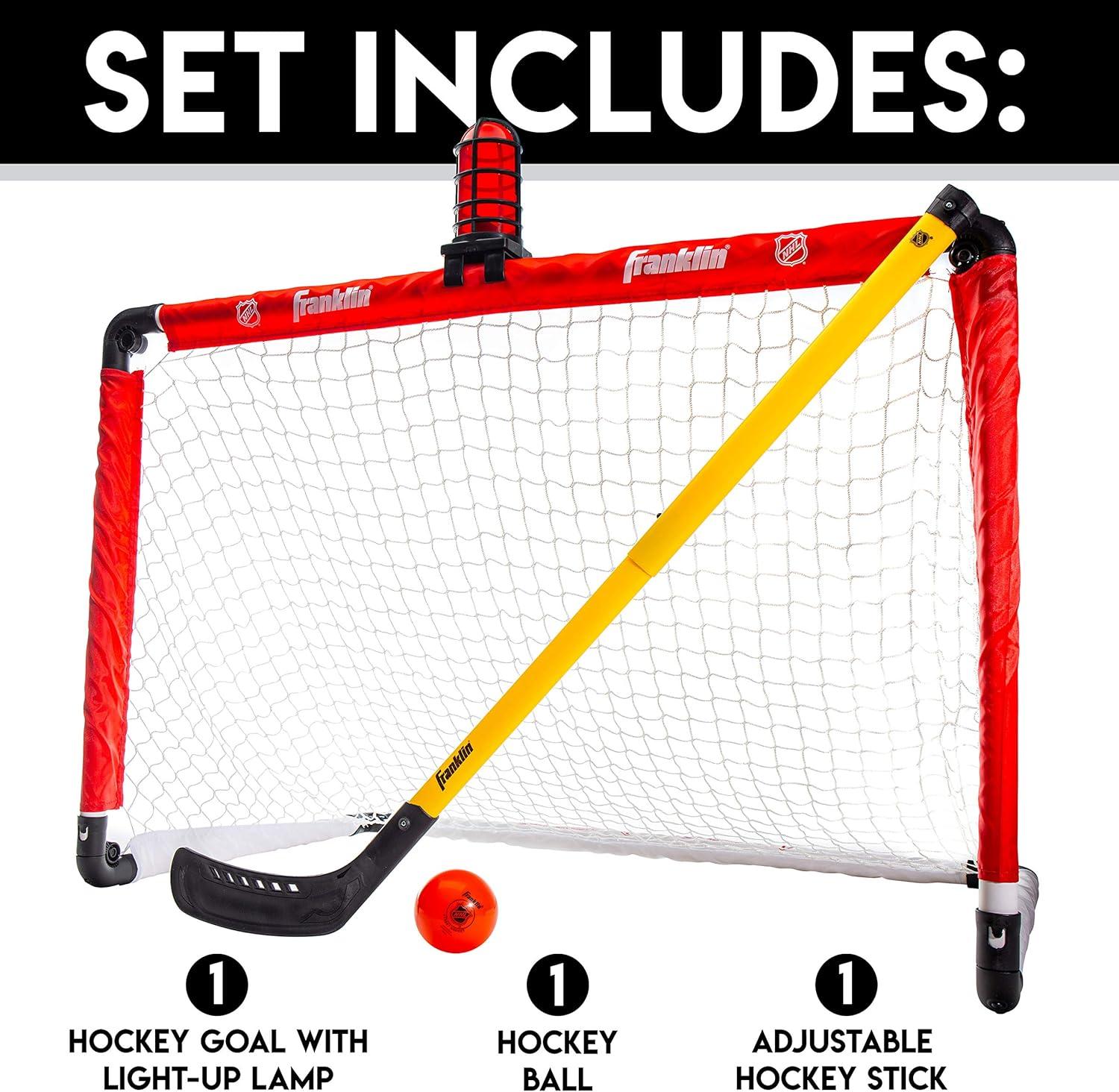 imageFranklin Sports Mini Hockey Goal Set NHL Light Up Knee Hockey Goal and Stick Set with Hockey Ball Perfect for Indoor Floor Hockey and Knee Hockey Red 36quotL x 36quotW x 24quotH
